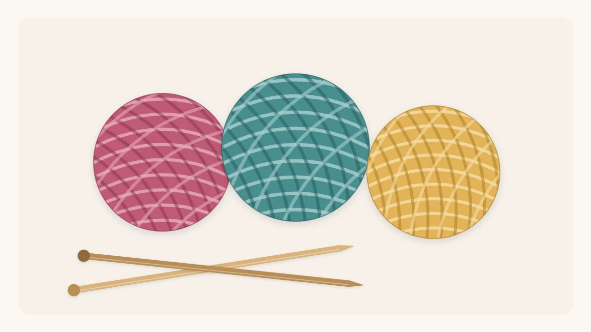 Three balls of yarn in different colors next to a pair of knitting needles