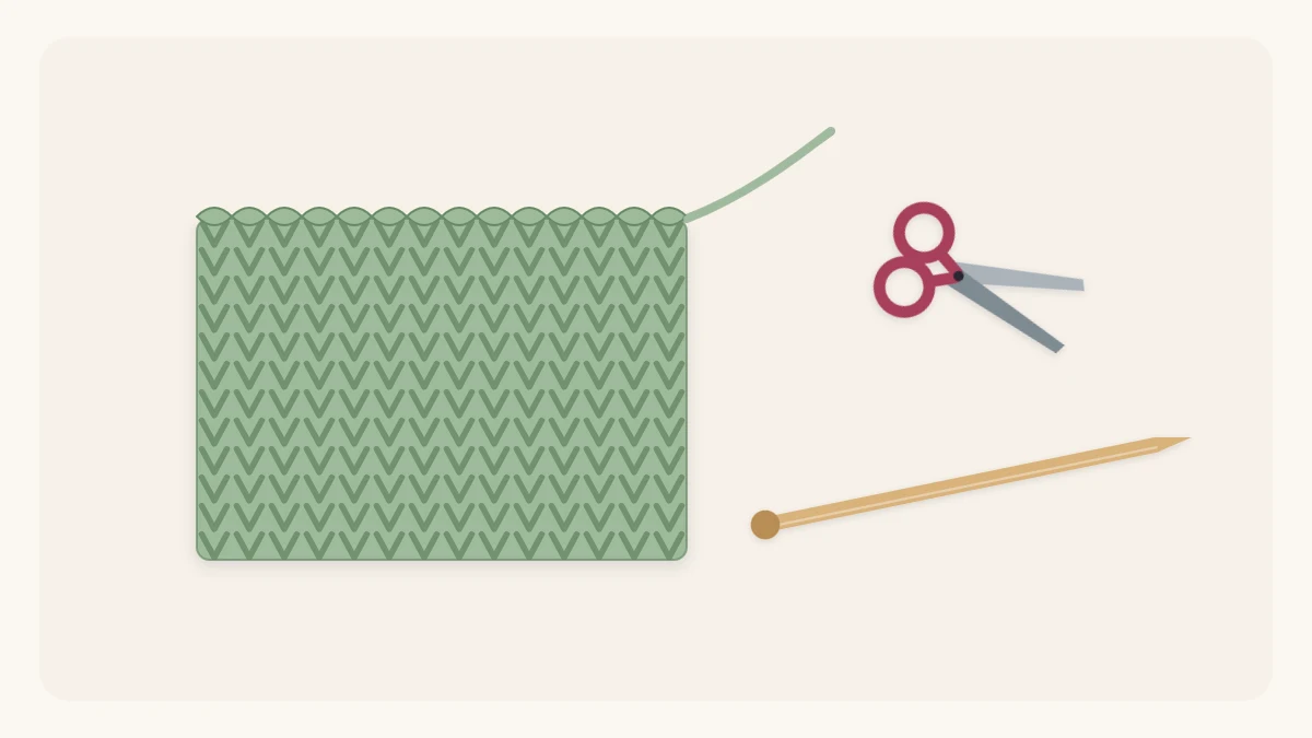 A finished swatch with a bound-off top edge lying next to an empty needle and scissors