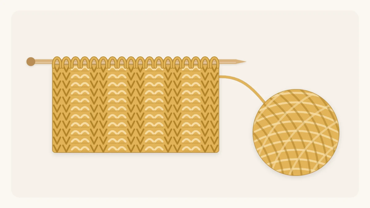 A stretchy band of ribbed knitting with vertical columns on needles, attached to a ball of yarn